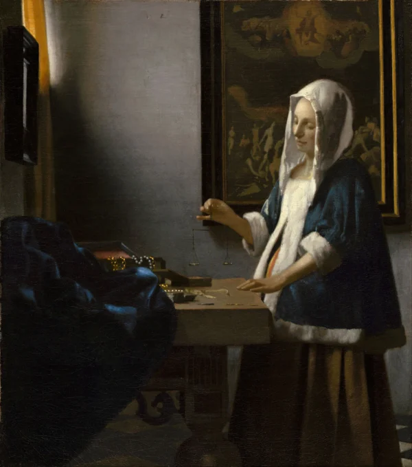 Woman Holding a Balance (c. 1662-1663)