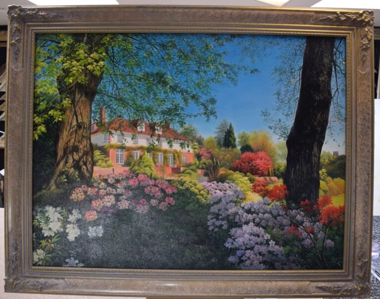 Painting of a house seen across a garden of flowering shrubs, shown in an ornate frame