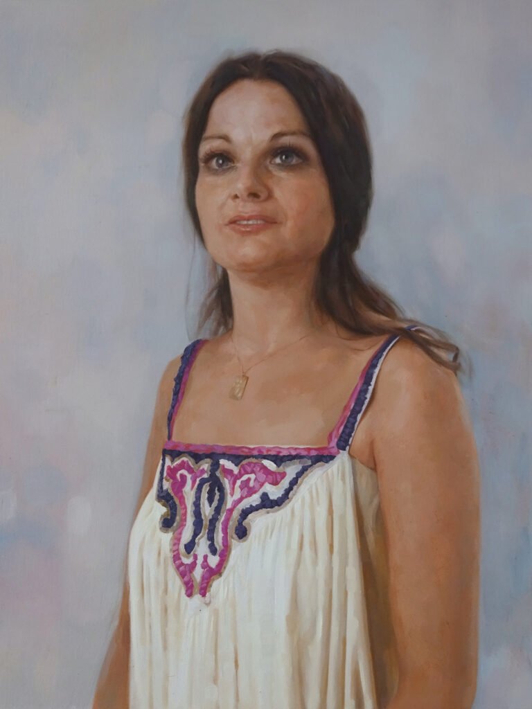 Portrait of a woman in an embroidered summer dress, hand-painted in oil from a photograph