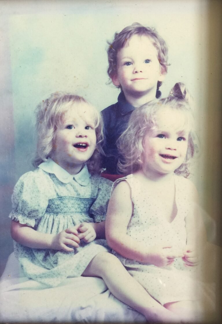 Older family photograph of three young children