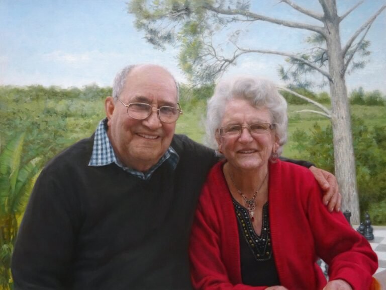 Portrait of an older couple seated outdoors, hand-painted in oil from a photograph