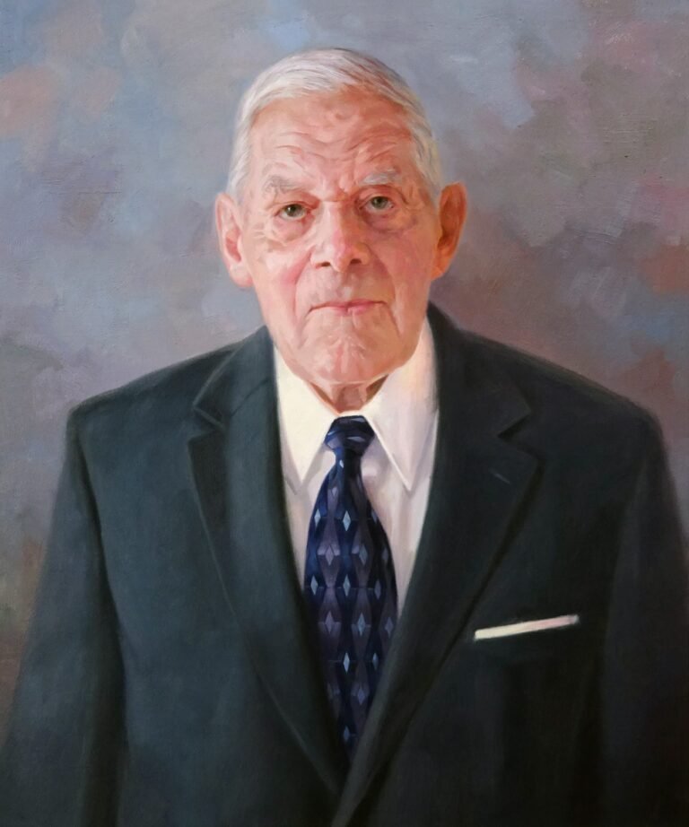 Portrait of an older man in a dark suit and patterned tie, hand-painted in oil from a photograph