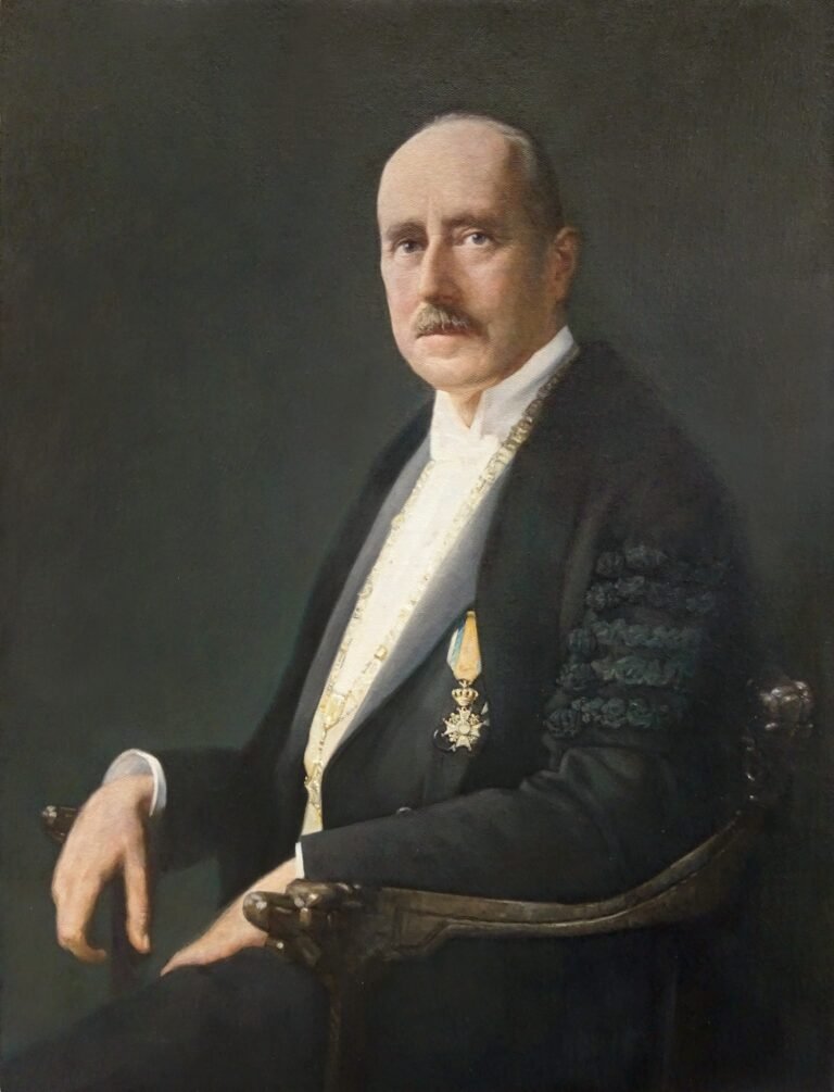 Formal seated portrait of a gentleman in dark formal dress, hand-painted in oil from a photograph