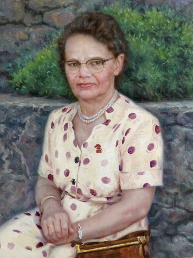 Portrait of a woman in a polka-dot dress seated by a stone wall, painted from a black-and-white photograph, hand-painted in oil from a photograph